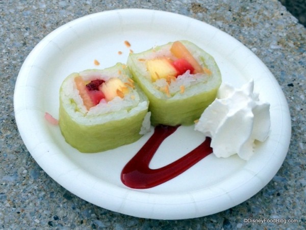 Frushi-Fresh-strawberries-pineapple-and-cantaloupe-rolled-with-coconut-rice-atop-a-raspberry-sauce-sprinkled-with-toasted-coconut-and-whipped-cream-600x452.jpg